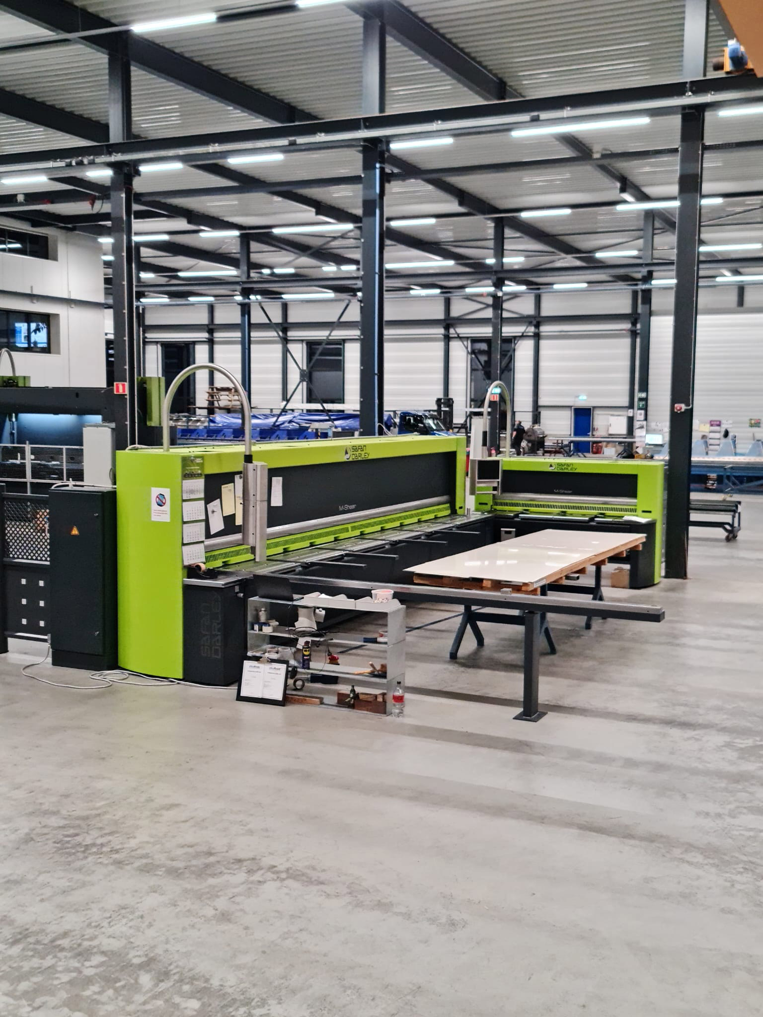 Knipschaar in de werkplaats van Stacon